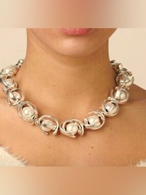 “Lisa  In The Sky" necklace by the  UNOde50